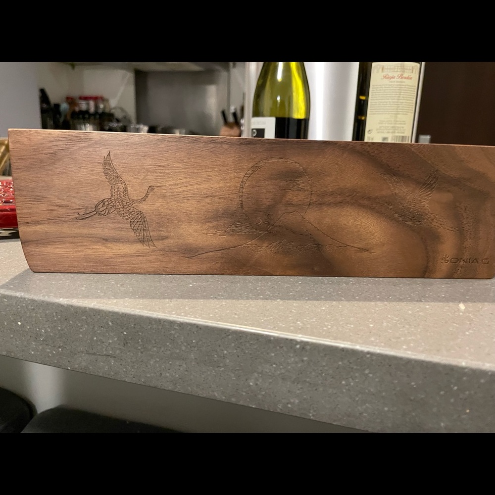 Sonia G- A beautiful piece but I feel the wood used was way too dark.